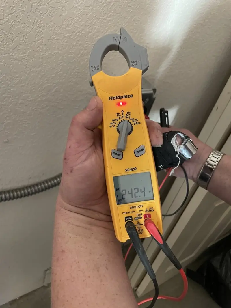 Voltage testing with clamp meter during Aluminum Wiring Replacement in Hobbs